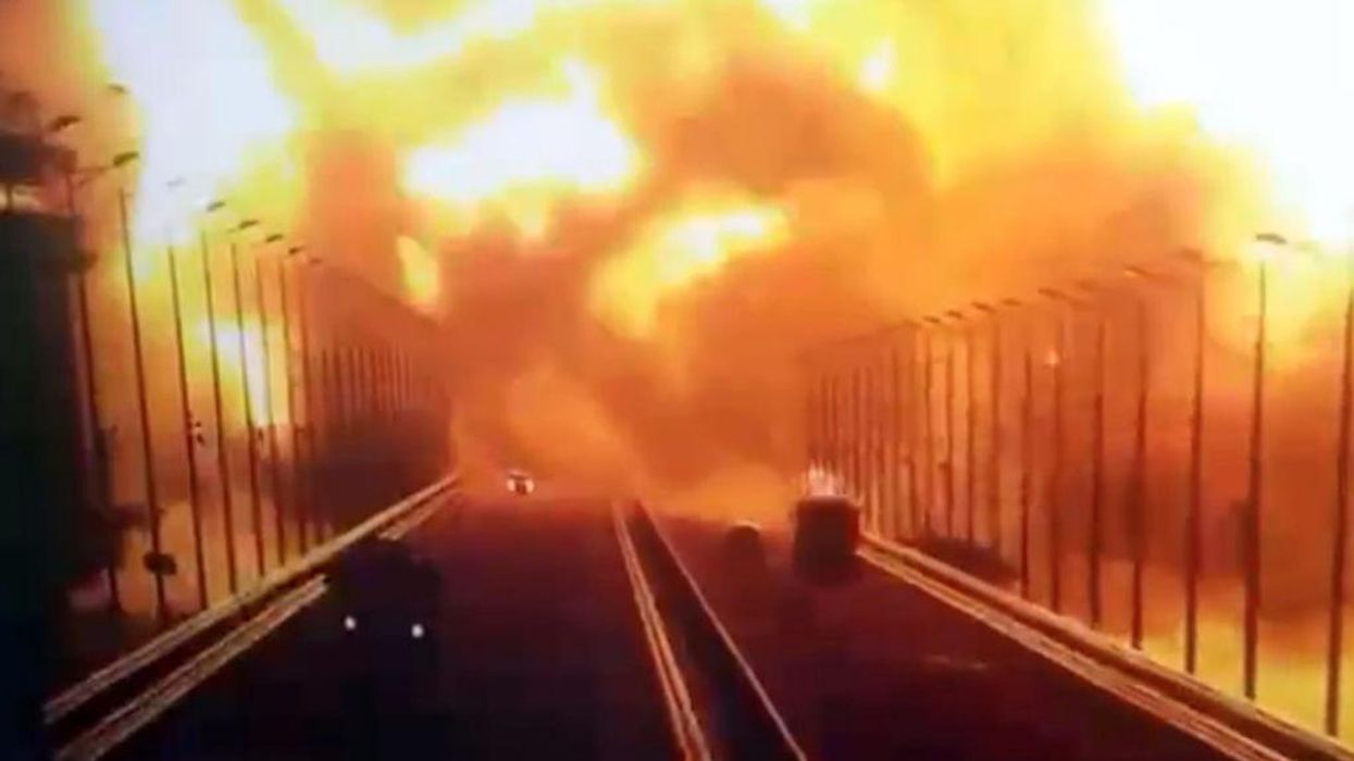 Video shows moment key bridge connecting Crimea and Russia is rocked by massive explosion, Ukraine official declares bombing is just 'the beginning'