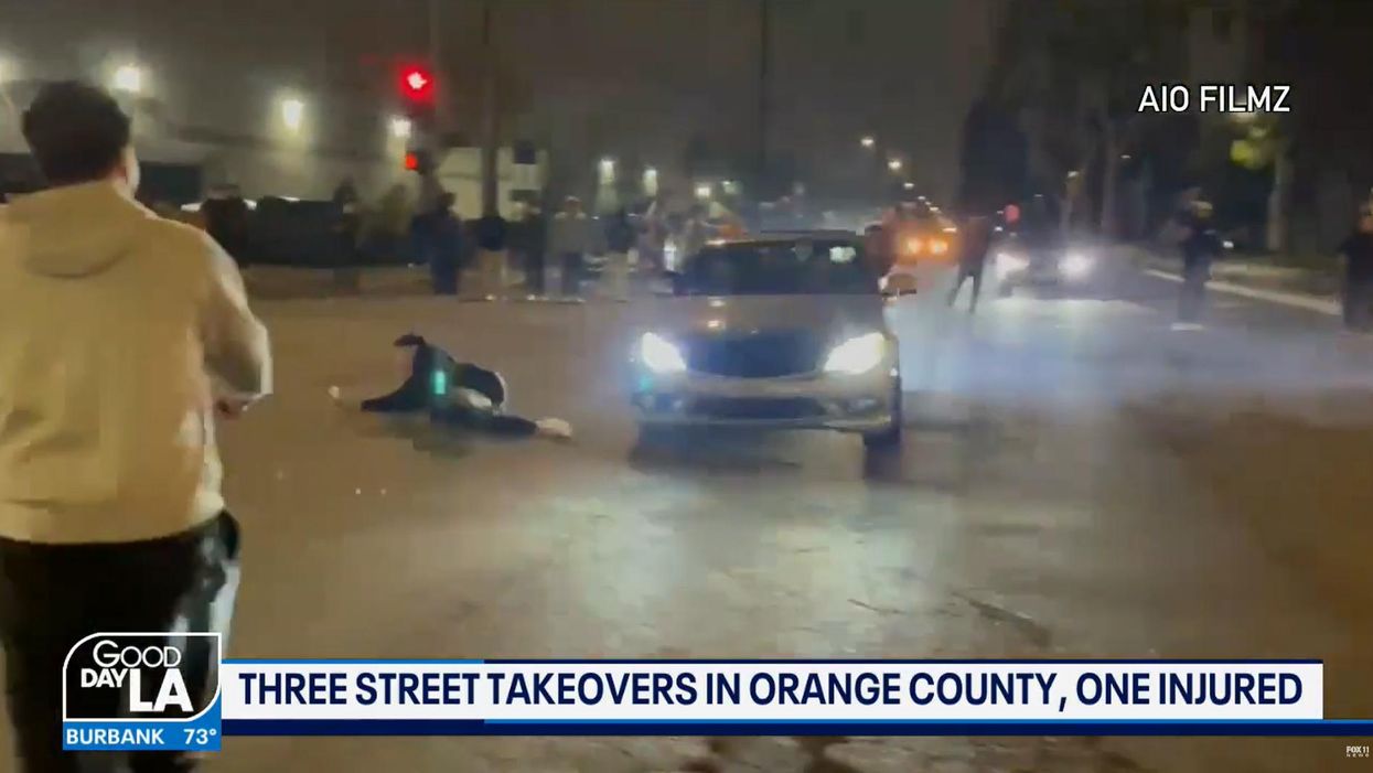Footage captures moment a man gets slammed by car during another anarchical 'street takeover' in Democrat-run California