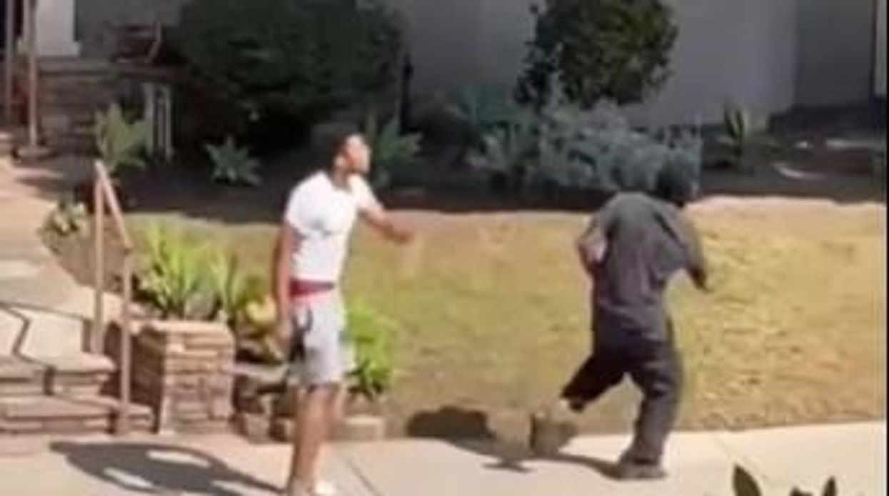'You come around here bullying people on my f****** street': Video shows young black man reportedly defending elderly Asian man from a violent car jacking