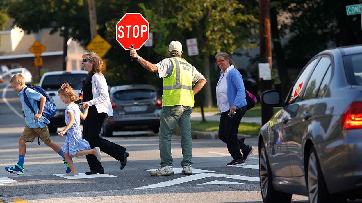 Drag queen recruited by school district to serve as crossing guard
