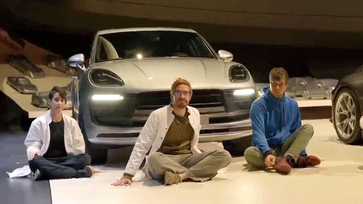 Climate protesters glue their hands to floor of car exhibit, get upset Volkswagen won't bring them bowls to defecate and urinate into