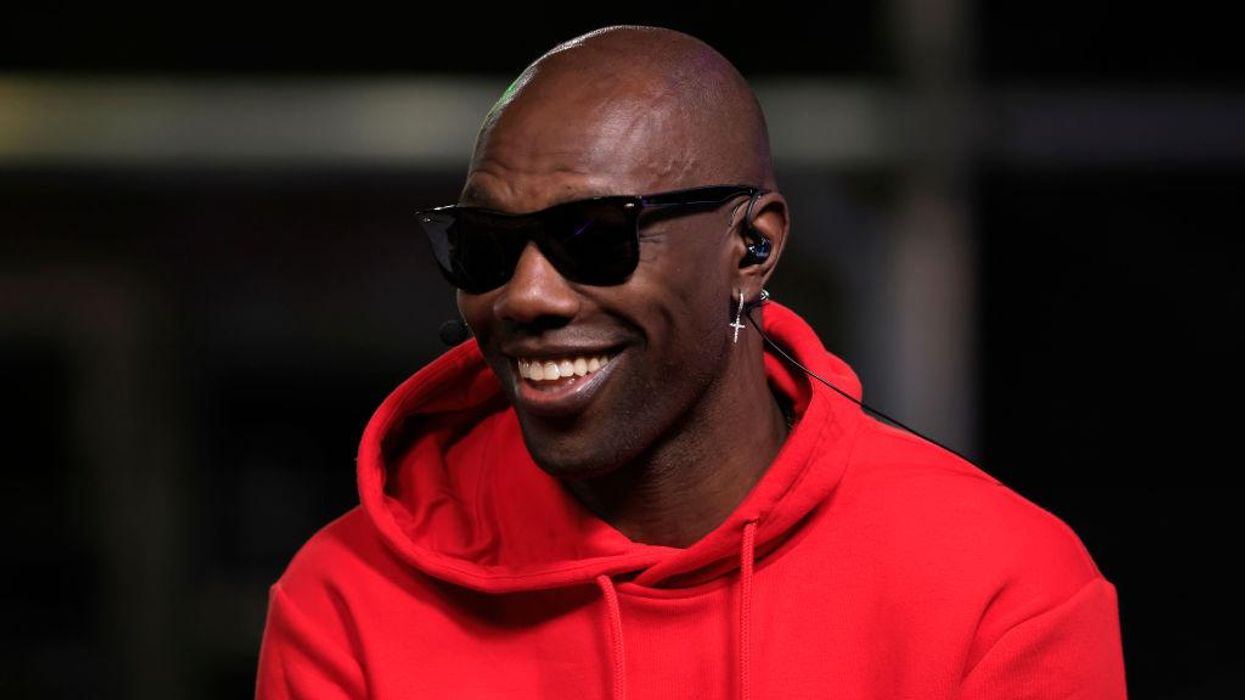 'You're a black man approaching a white woman': Neighbor of former NFL star Terrell Owens faces charges after racial confrontation