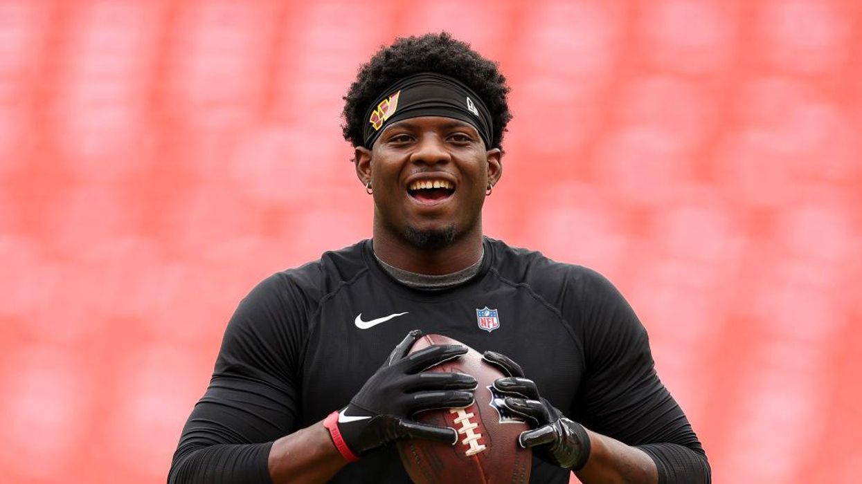 Police arrest suspect in the shooting of NFL running back Brian Robinson, and he's only 15