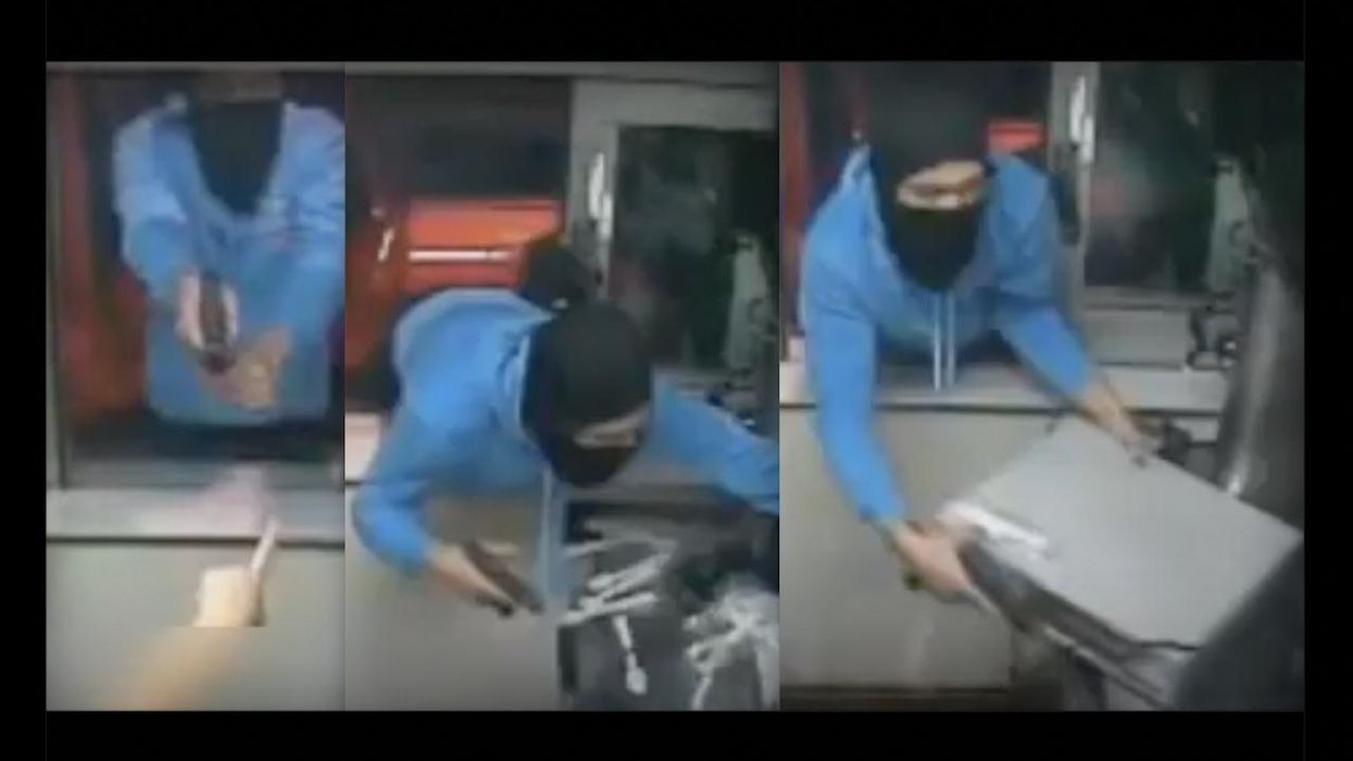 Philly crooks getting more brazen? This gun-toting thug simply reaches into McDonald's drive-thru window and rips out cash register