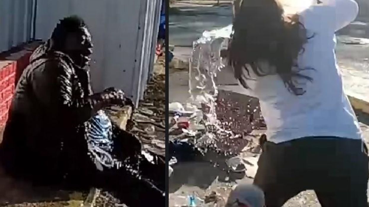 'Move! Not telling y'all again': Employee fired after viral video suggests she poured water on homeless person sitting outside convenience store on freezing cold day