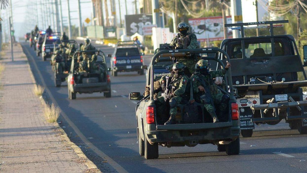 War zone in Mexico: 30 die during arrest of El Chapo's son; video shows Sinaloa Cartel retaliate by burning city, shooting commercial airplanes, trying to kidnap doctors