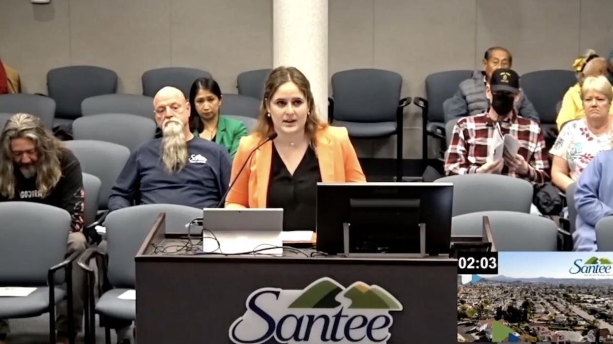 'I saw a naked male in the women's locker room': Teen girl breaks down in tears telling city council of being 'terrified' seeing unclothed man amid her shower at YMCA