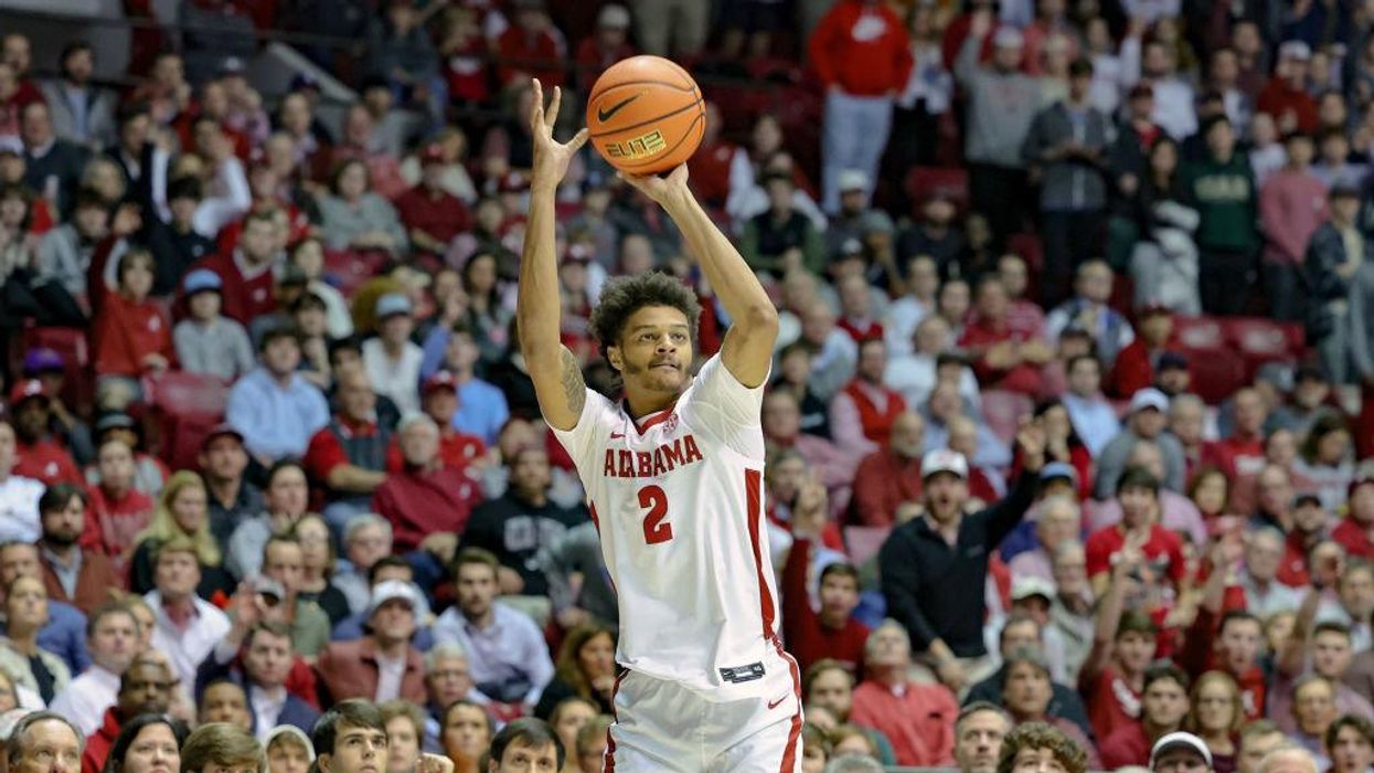Alabama basketball player Darius Miles charged with capital murder in shooting death of 23-year-old woman, suspect 'appeared to be crying during a perp walk'