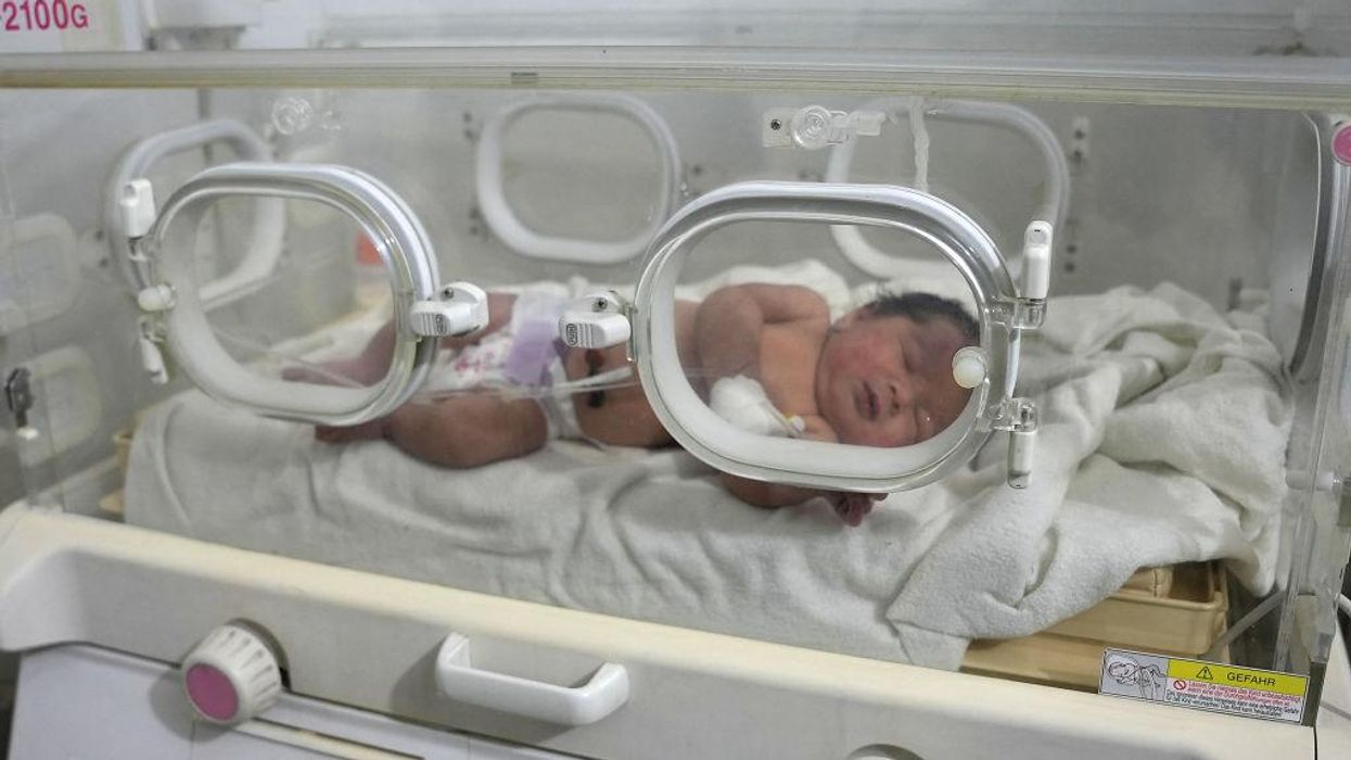 Miracle newborn rescued from earthquake's rubble survives with umbilical cord intact; family perishes