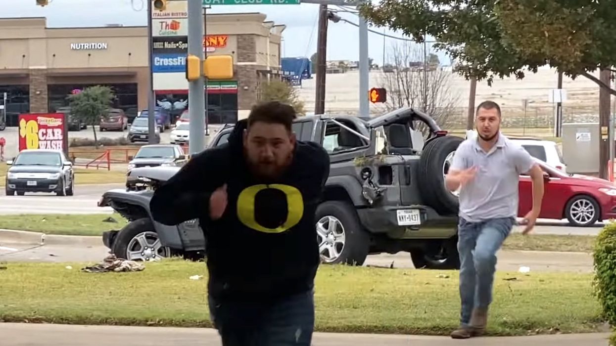 VIDEO: Bystander chases and tackles drunk driver running from car accident where police officer was killed