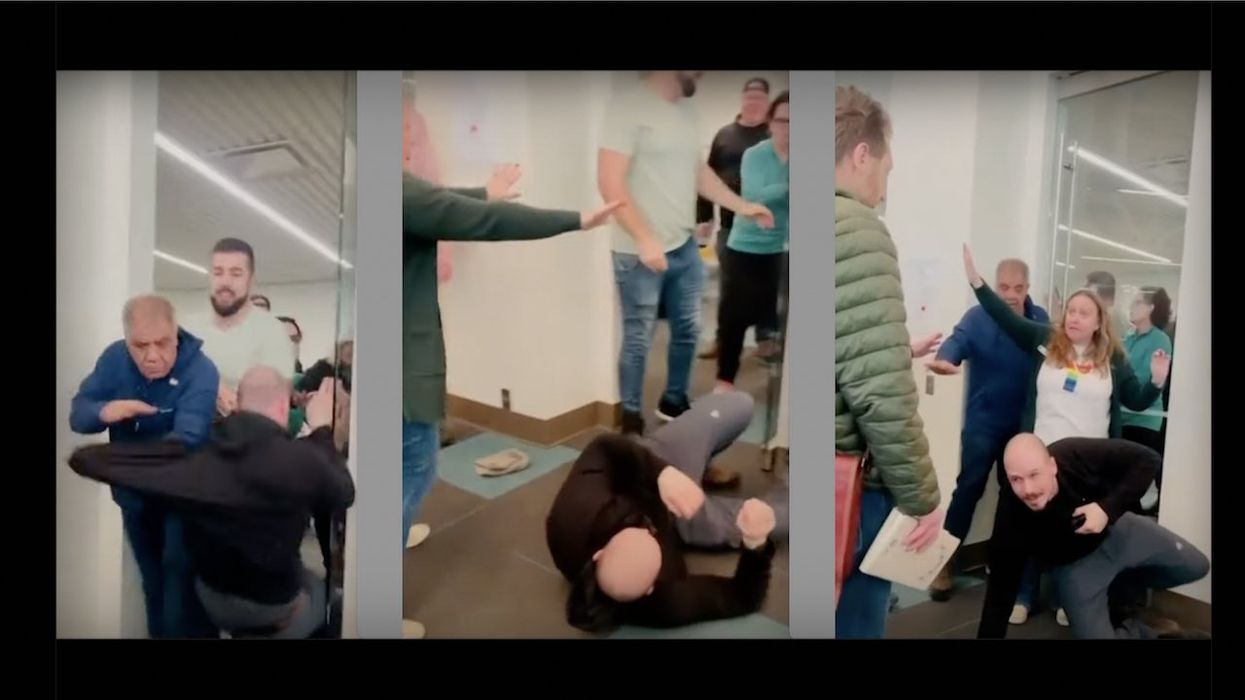 Pastor shoved out door, knocked flat on his back after protesting library's drag queen event for children. Now Canadian cops have charged pastor with hate crime.