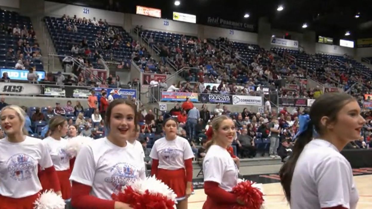 Small high school basketball team had no band during a tournament. A rival school's band made sure it wouldn't face fate in silence.
