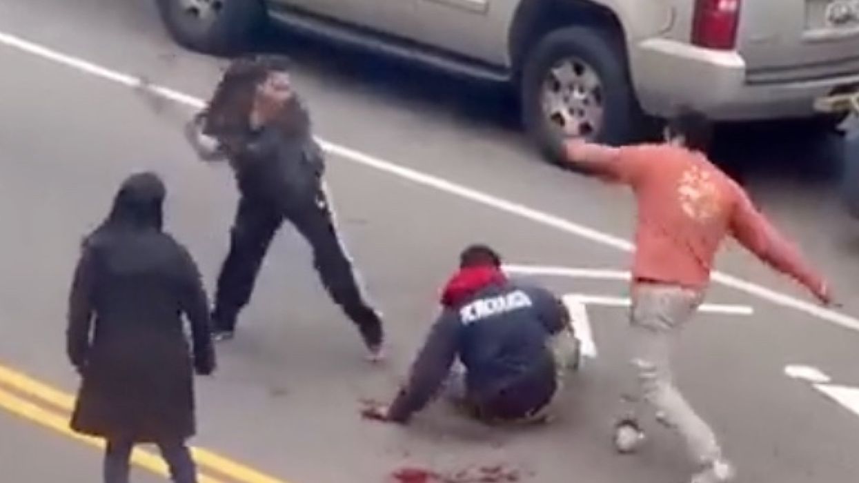 Shocking video shows couple brutally beating and stabbing a neighbor over a parking spot dispute in NYC