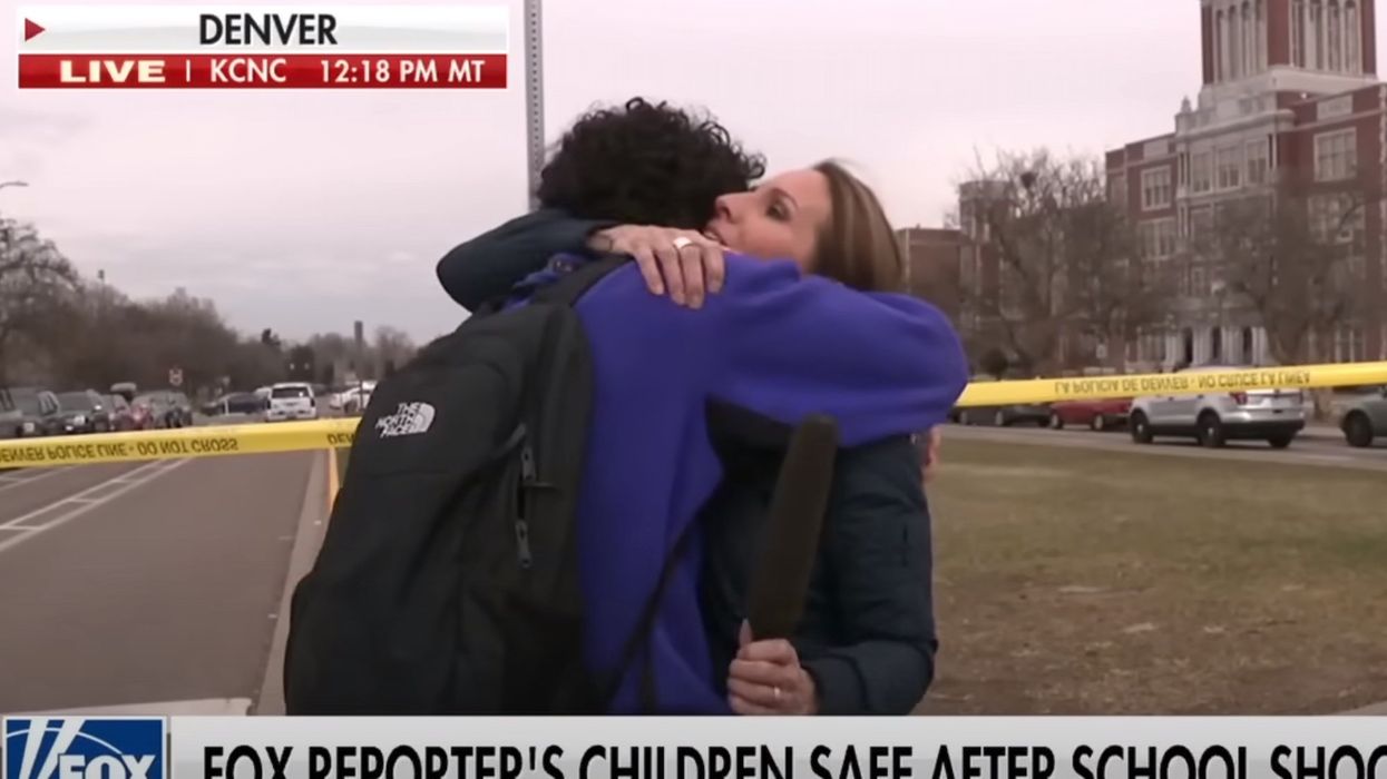 Fox News reporter interrupts report on school shooting to reunite with her son in viral moment