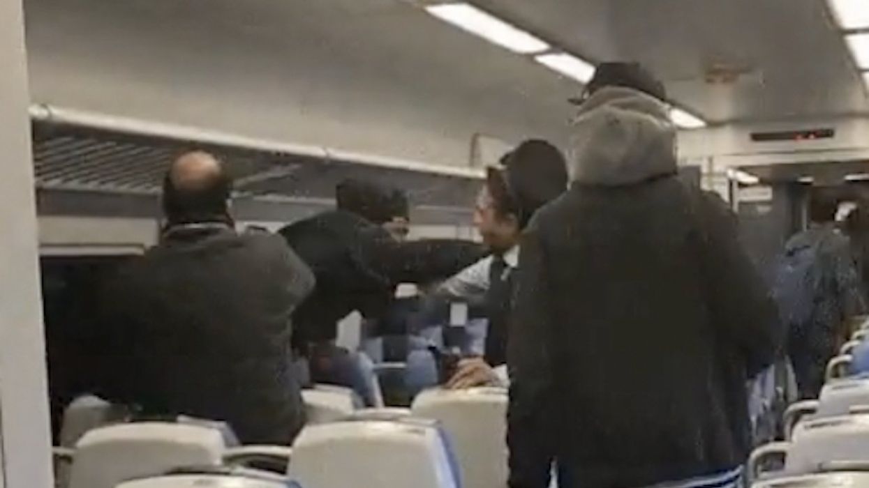 17-year-old male allegedly uses ticketing machine to pummel train conductor's face; 2nd conductor tries to help but gets 'thrown around' train'; victims hospitalized