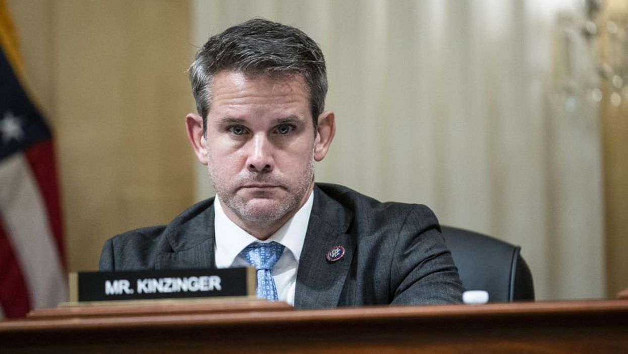 Adam Kinzinger accuses some Republicans of having a 'gun fetish' — then damning picture of him resurfaces