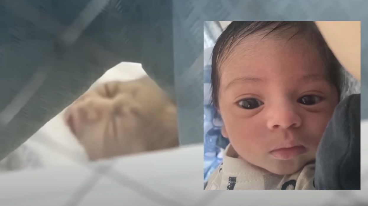 Nurse arrested after a father records her slamming his newborn baby face down in hospital bassinet