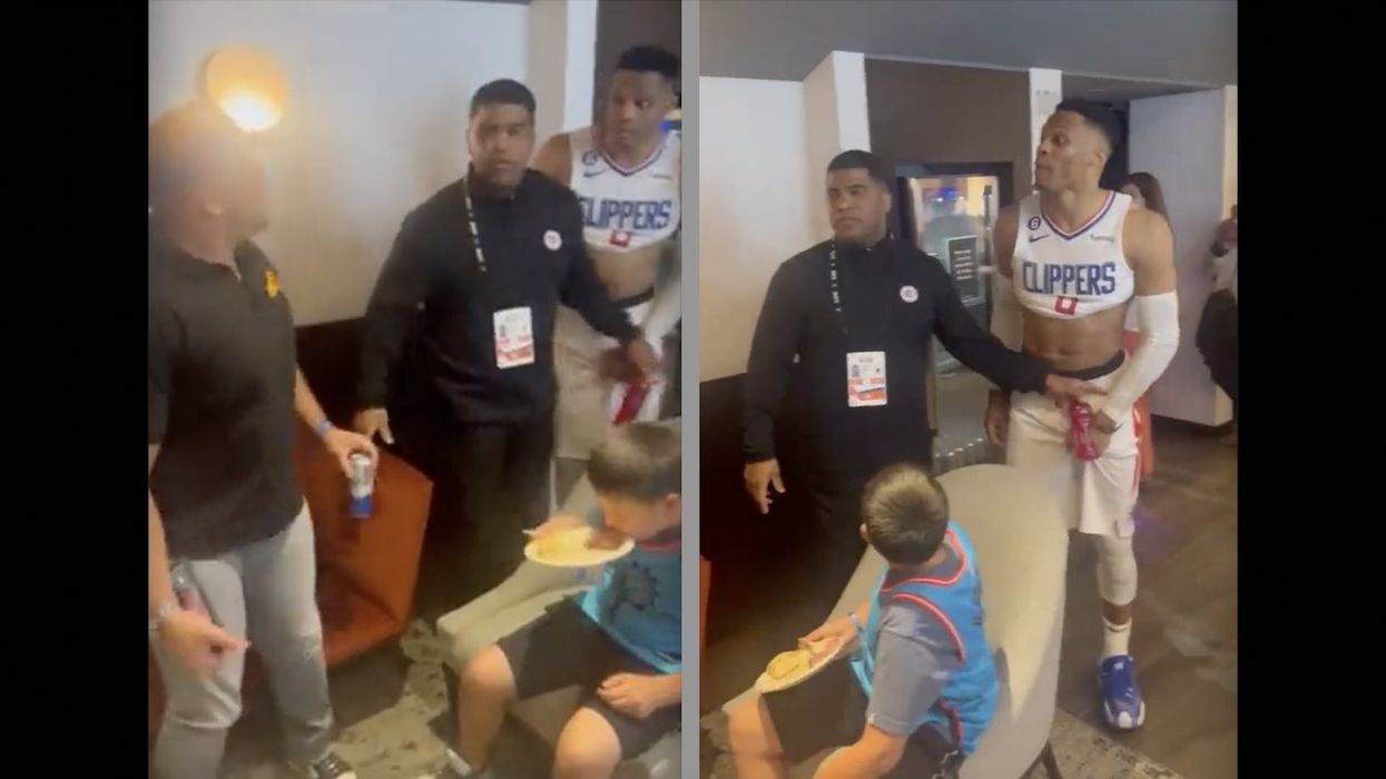 'Watch your mouth, motherf***er': NBA star Russell Westbrook gets in fan's face at halftime while young boy — apparently fan's son — watches