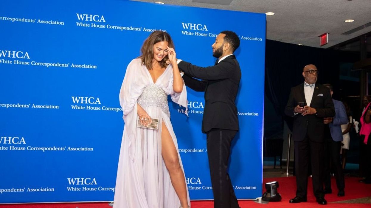 Chrissy Teigen blasted for having servants carry her dress through streets to the White House Correspondents' Dinner