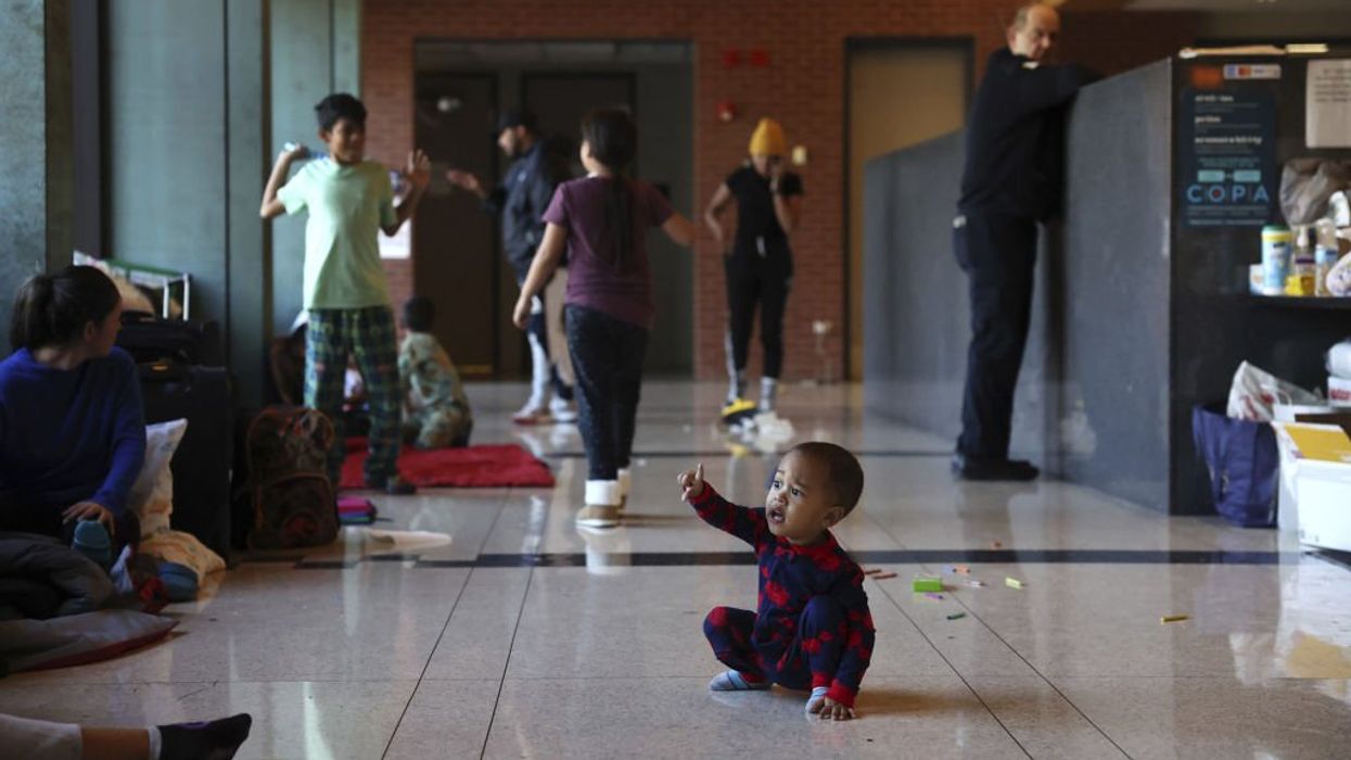 Chicago overwhelmed with migrant influx; families sleeping in police stations