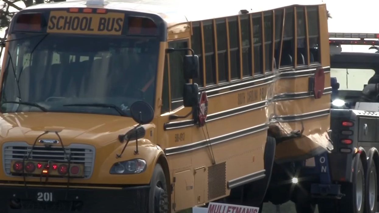 Security video shows tanker truck slamming into school bus, 17 children hospitalized