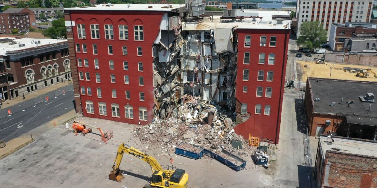 Pink Building Collapsed Officials claimed no one left in partially collapsed apartment building ...