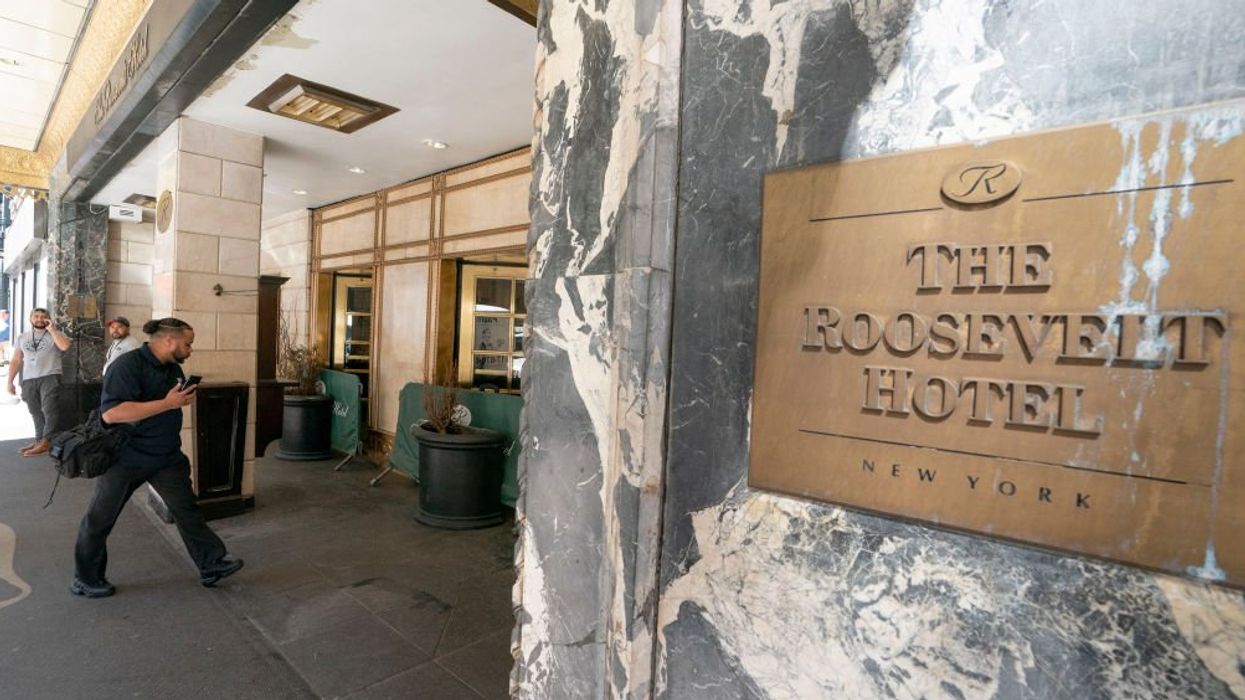 Irate asylum-seeker bludgeons hotel worker over the head with ‘No Parking’ sign after being booted from shelter for disorderly conduct — then dodges arrest by fleeing scene on foot