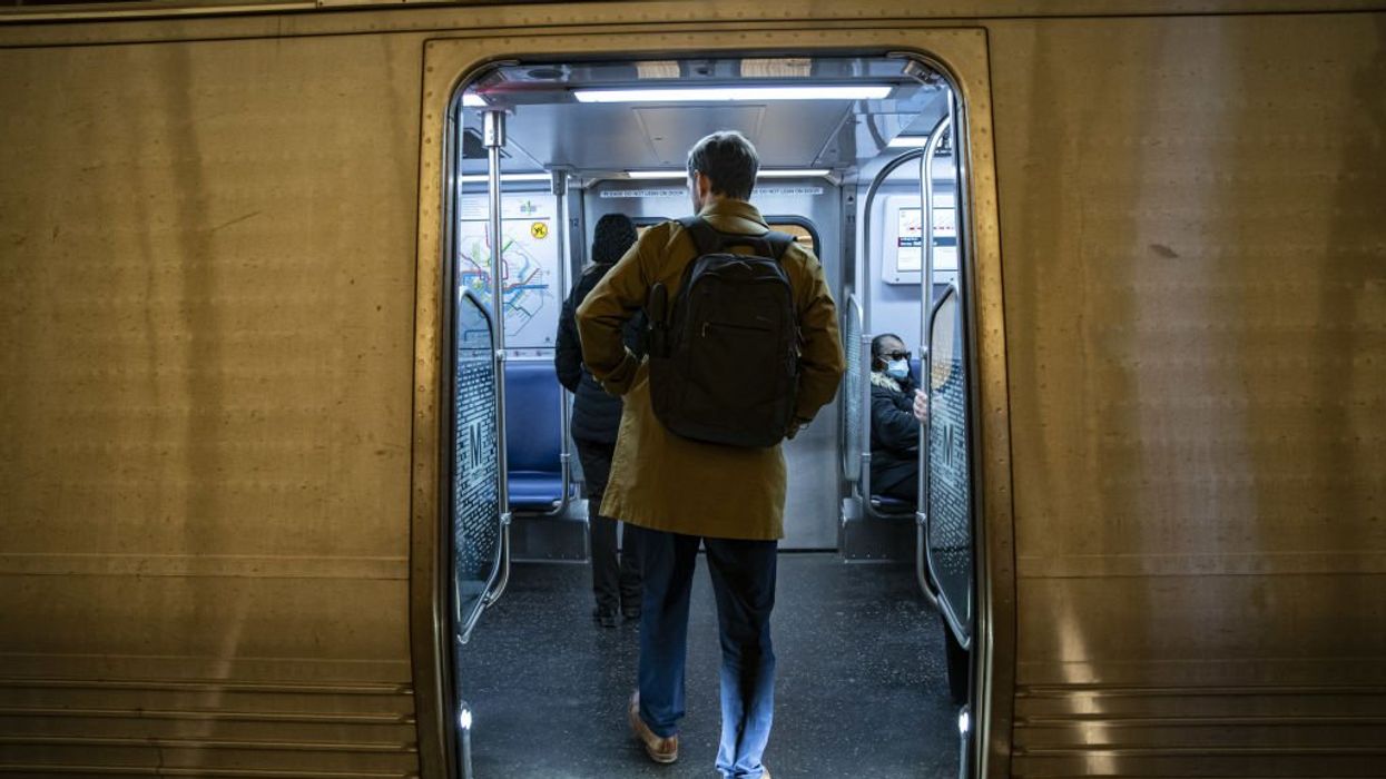 DC Metro's 'chief experience officer' apologizes after posting picture of a random commuter's groin to Twitter, complaining about 'manspreading'