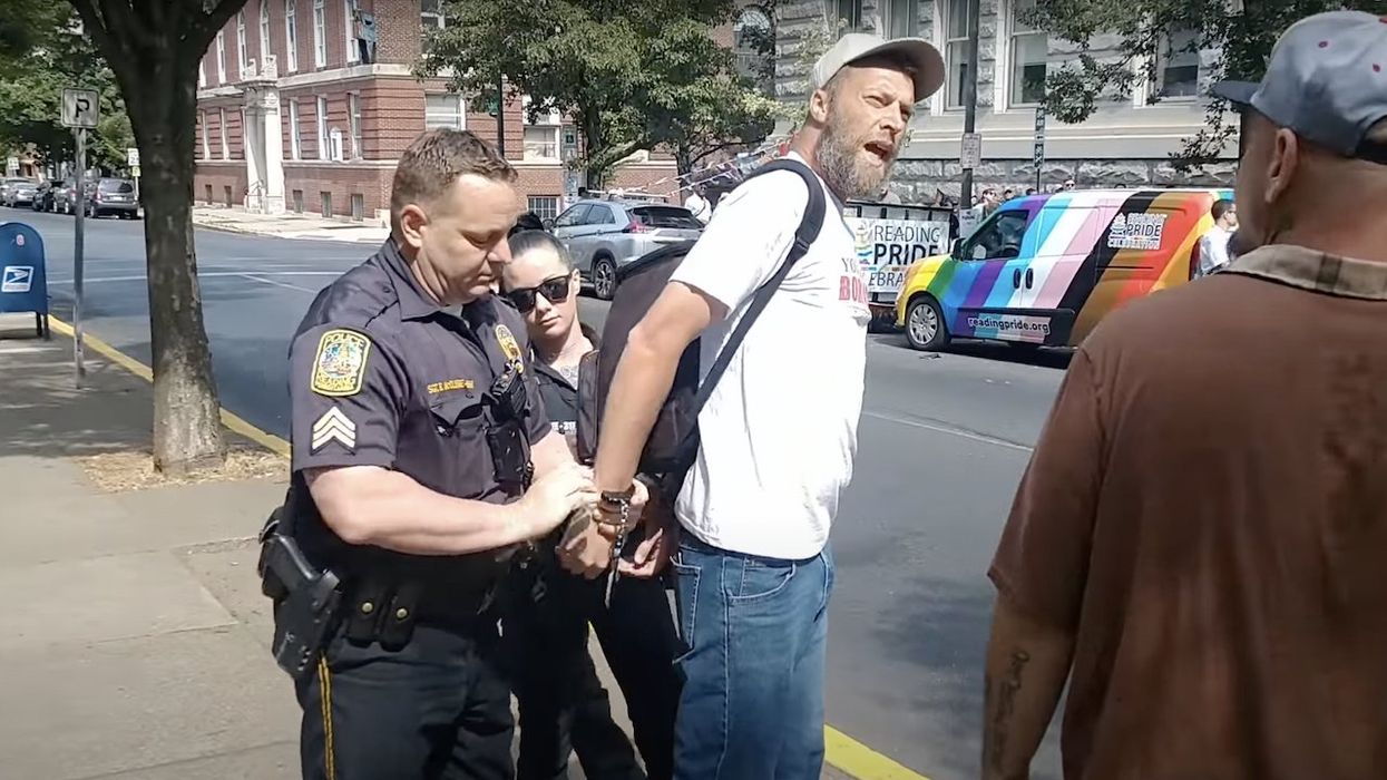 Charges dropped against man arrested after trying to quote Bible to Pride rally attendees; official reportedly says legal action may come against police