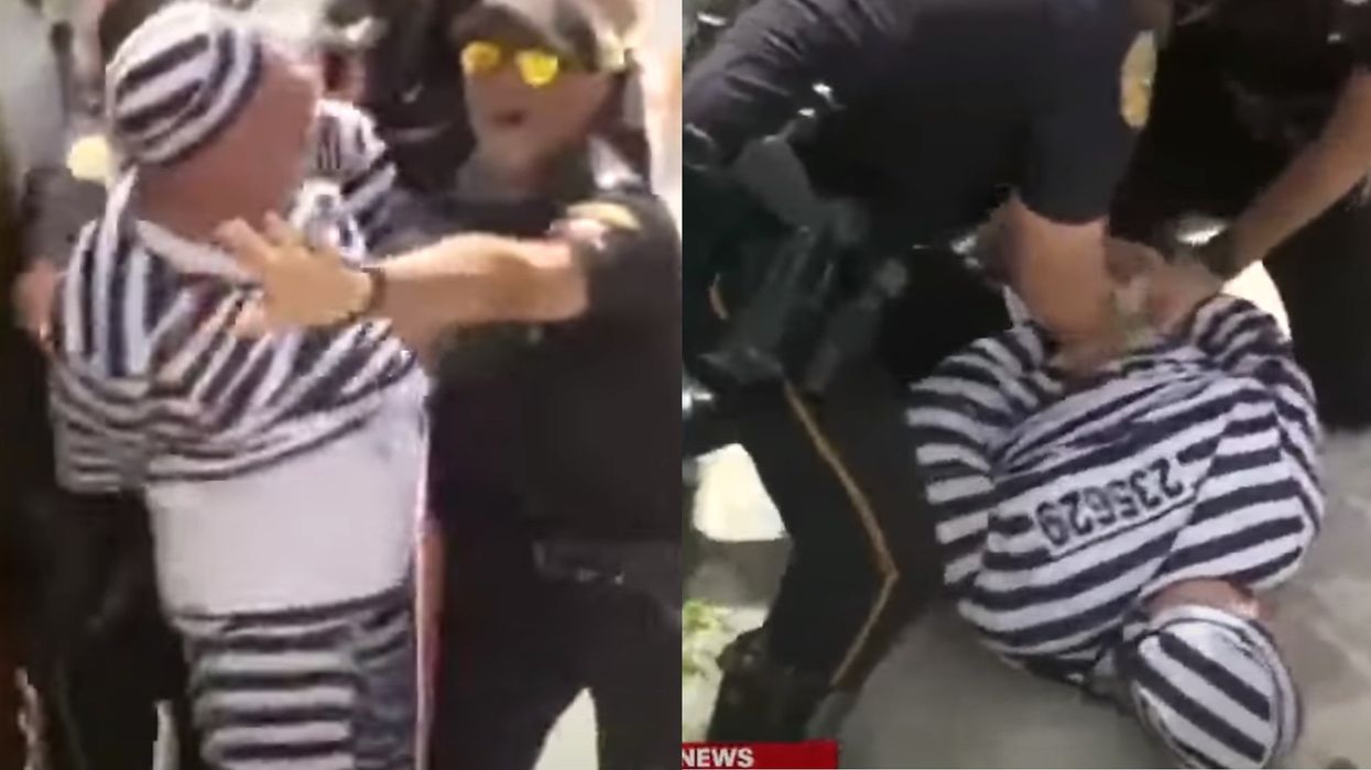 Protester tackled and arrested for rushing at Trump's motorcade with a protest sign after arraignment in Miami