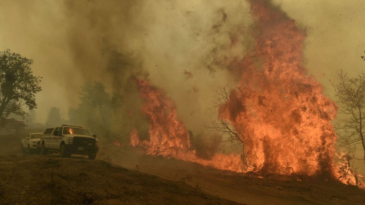 California man arrested on suspicion of starting fire that destroyed nearly 200 buildings, forced 6,000 people to flee, burned 19,000 acres