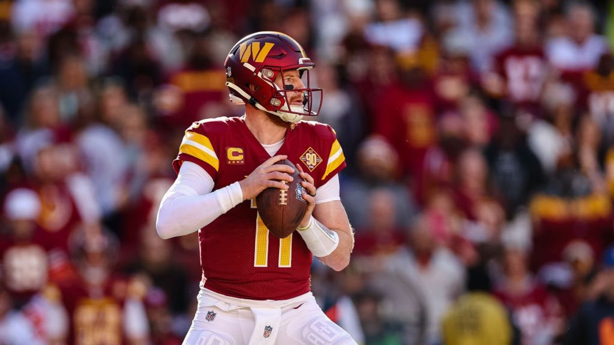 NFL fans harshly slam Super Bowl-winning quarterback for 'barbaric' hunting photos of a bear, football players show support