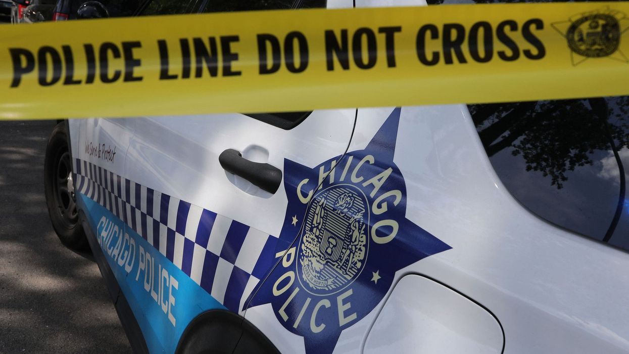 Armed man in ski mask tries to rob 3 men in Chicago, but one pulls out a gun and puts him in critical condition, police say