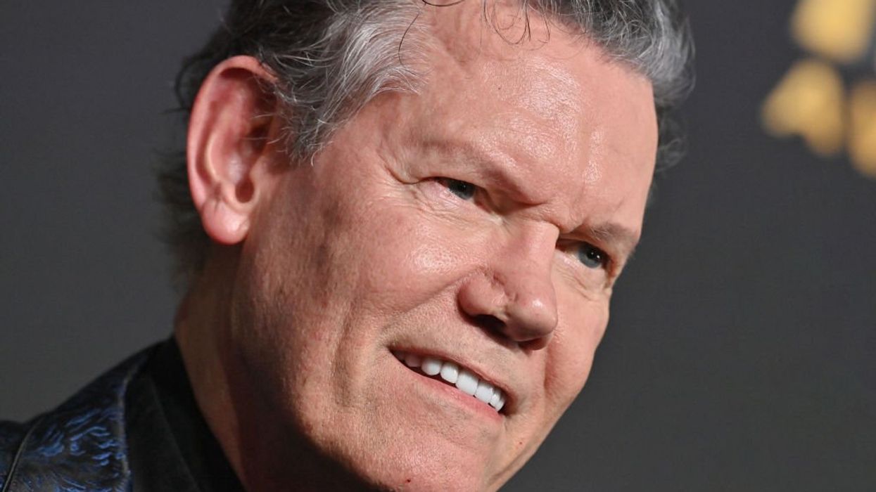 Country music icon Randy Travis mourns death of lighting tech after the man was allegedly murdered by his wife
