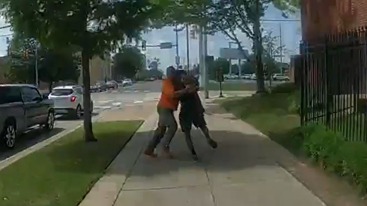 Truck driver spots police in hot pursuit of a suspect and decides to cut the chase short