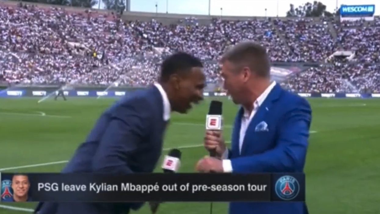ESPN analyst shocks colleague when he suddenly collapses live on air just minutes before soccer match: 'We need medical!'