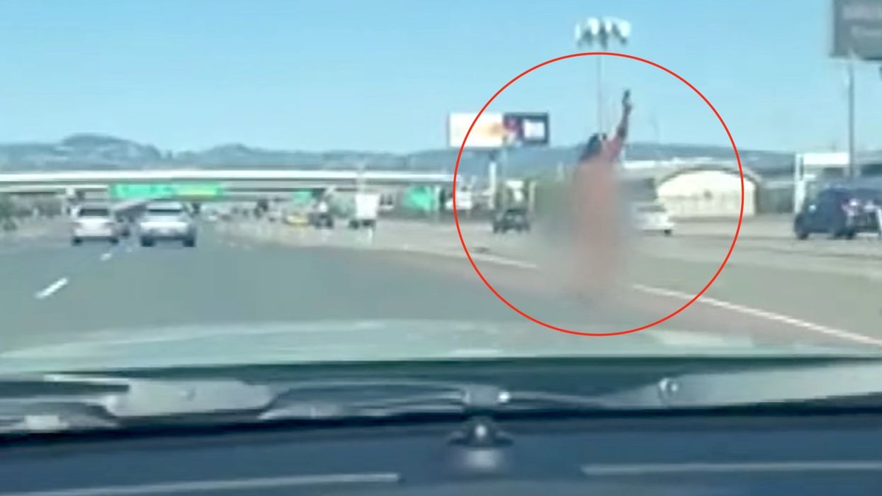 Bizarre video shows naked woman shooting indiscriminately at cars on bridge in San Francisco