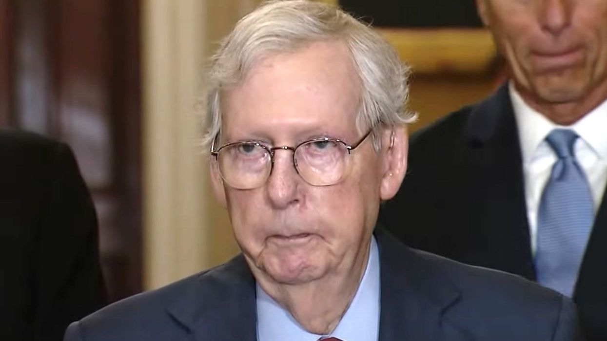 Mitch McConnell freezes mid-sentence during press conference and is escorted away from podium
