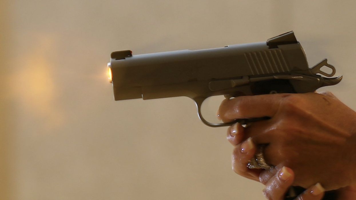 Pistol-packing woman shoots 2 burglars who charged at her, fought her after break-in, cops say