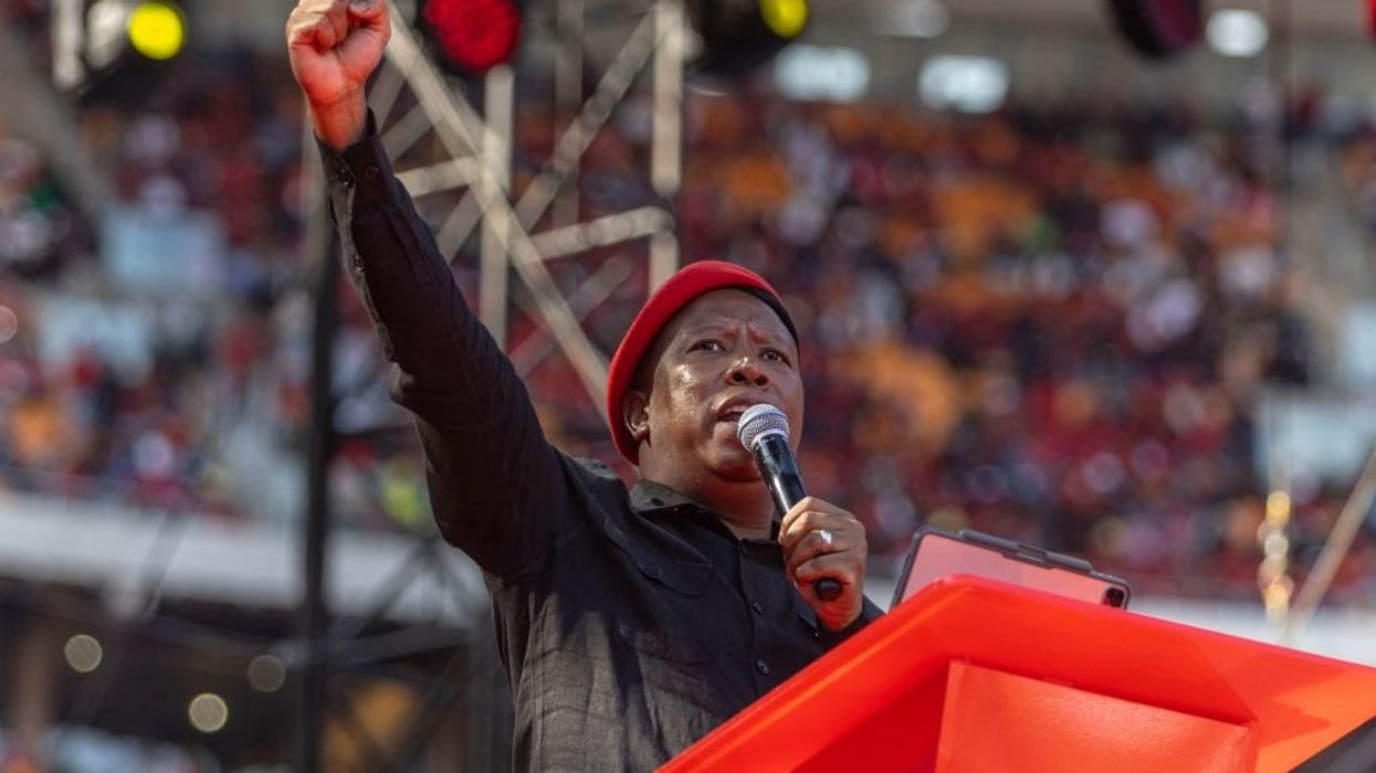 Video: Song about murdering white farmers sung in stadium packed with South African Marxists