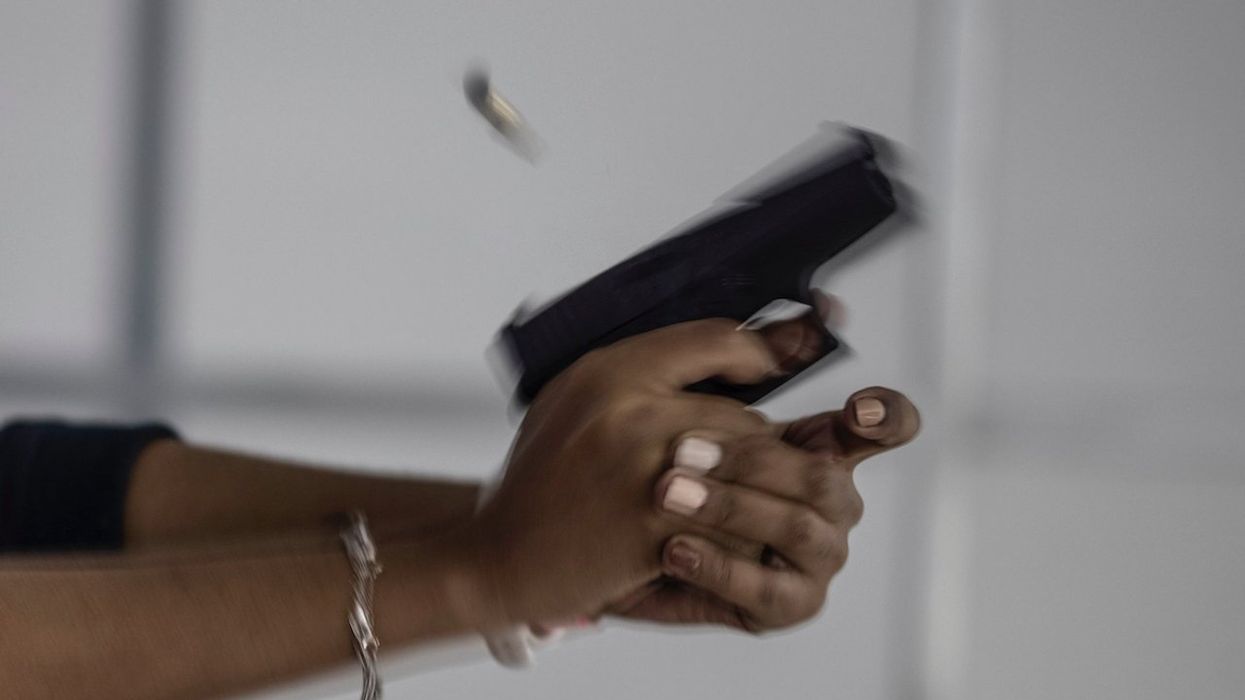 Man apparently fueled by road rage follows woman into parking lot, tries to enter her vehicle — but she's carrying a gun and fatally shoots him