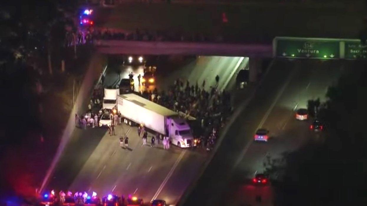 Protesters block highway with semi-truck, causing massive traffic backup to demand intervention in Armenian crisis