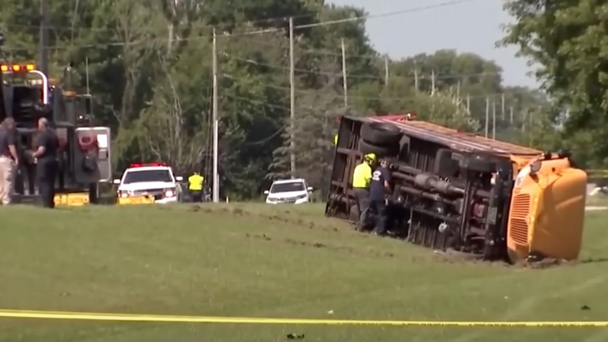 1 child dead and 23 injured after minivan crashes into school bus on first day of school in Ohio