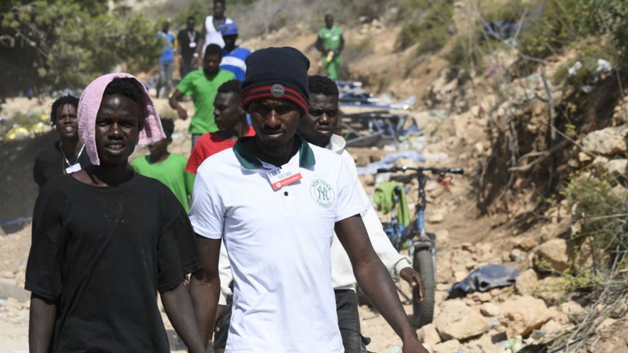 Italian prime minister says illegal aliens from Africa 'threaten the future of Europe' as migrants begin blocking roads on beleaguered Mediterranean island