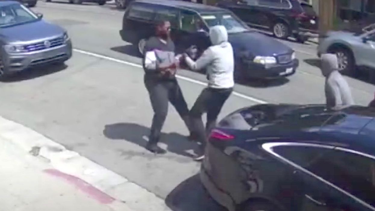 Video captures the moment karate instructors thwart alleged armed carjacking in broad daylight