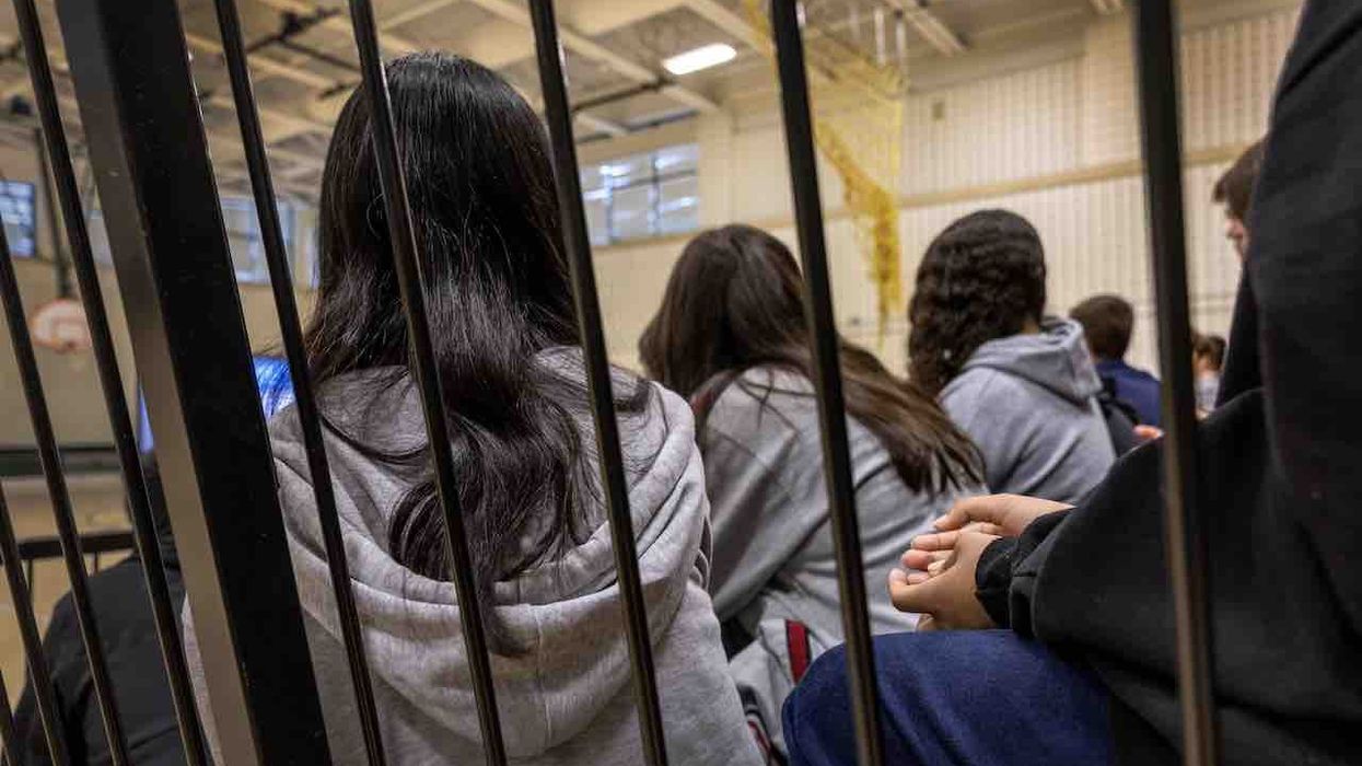 Viral video shows beatdown of middle school girl; many claim attacker is a male who identifies as female. District won't discuss attacker's gender identity.