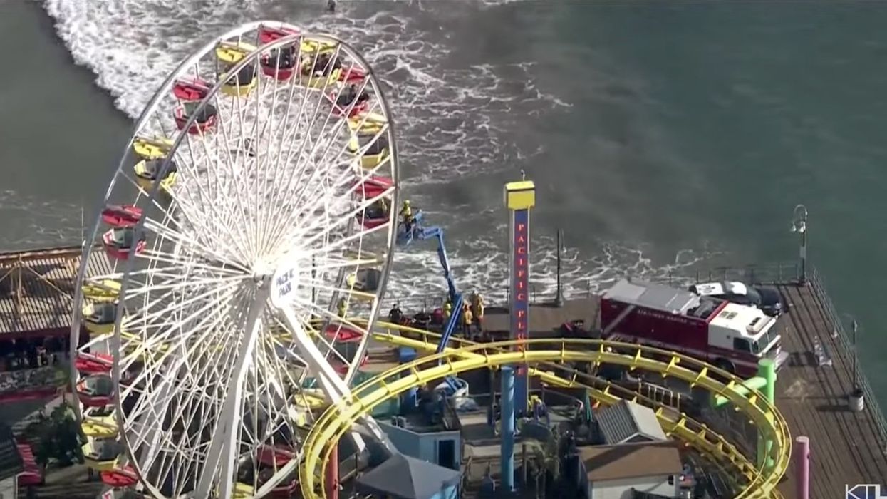 Santa Monica pier evacuated after man reportedly claiming to have a bomb climbs up famous Ferris wheel