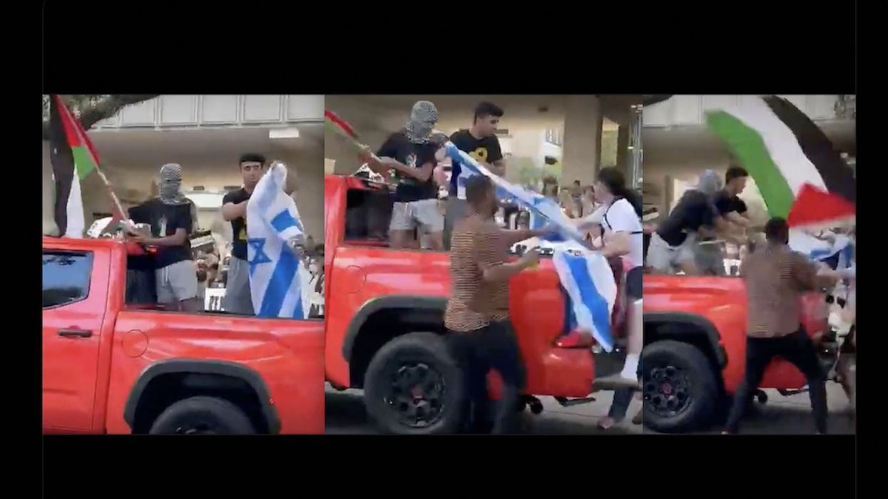 Video: Pro-Palestinian protester tries to burn Israeli flag, but pro-Israel protester runs up and pulls flag away — then all hell breaks loose