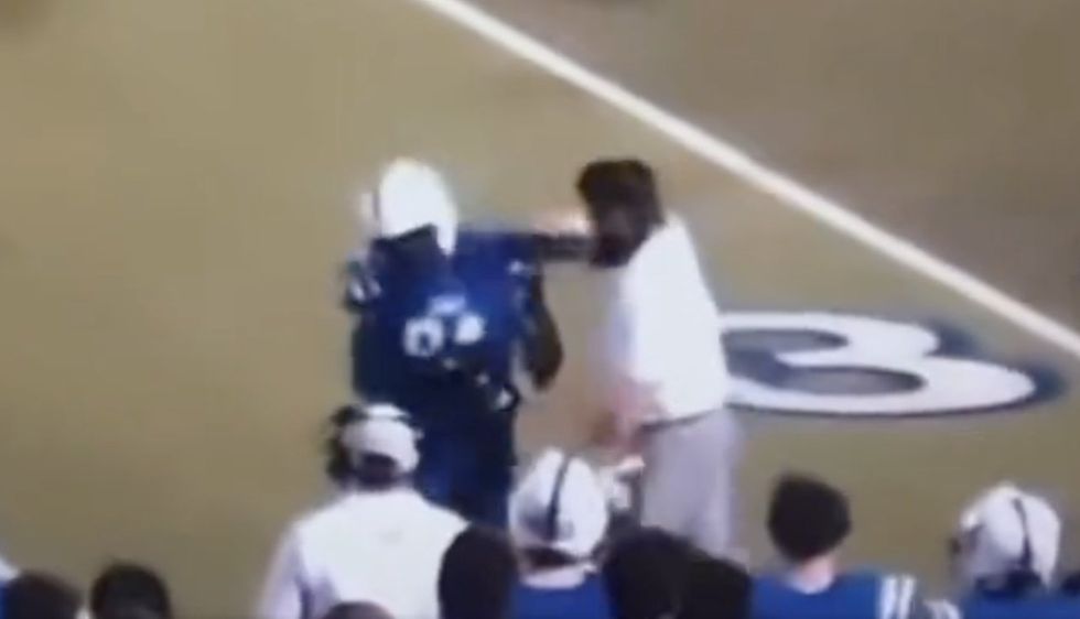 Video Catholic HS football coach hits players during game. Coach now