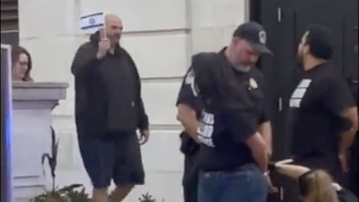 Democrat John Fetterman waves Israeli flag right at furious, anti-Israel protesters getting handcuffed at US Capitol